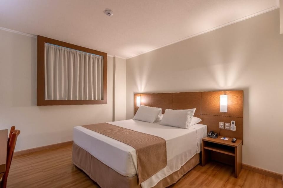 Deluxe Double Room, Private Bathroom, City View | Minibar, desk, blackout drapes, soundproofing