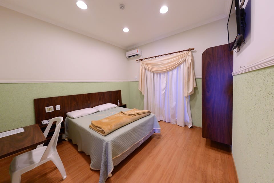Double or Twin Room | Minibar, desk, cribs (free), rollaway beds (free)