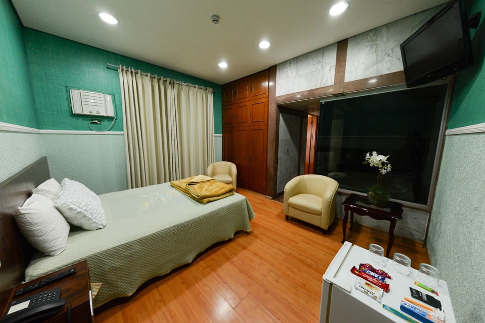 Double or Twin Room | Minibar, desk, cribs (free), rollaway beds (free)
