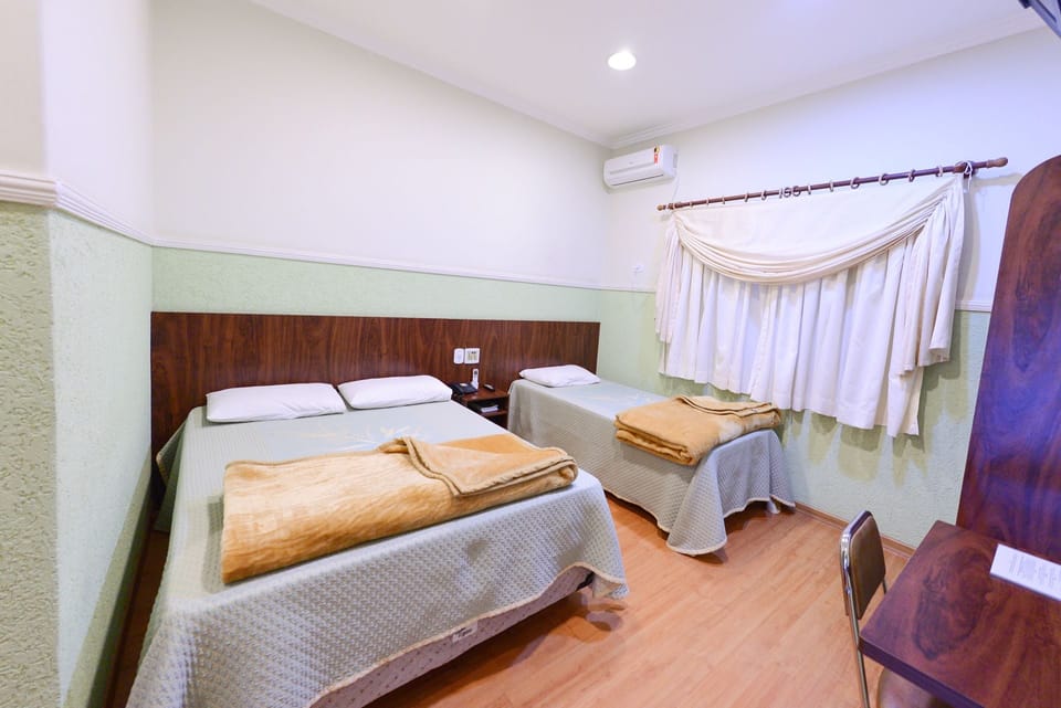 Triple Room | Minibar, desk, cribs (free), rollaway beds (free)