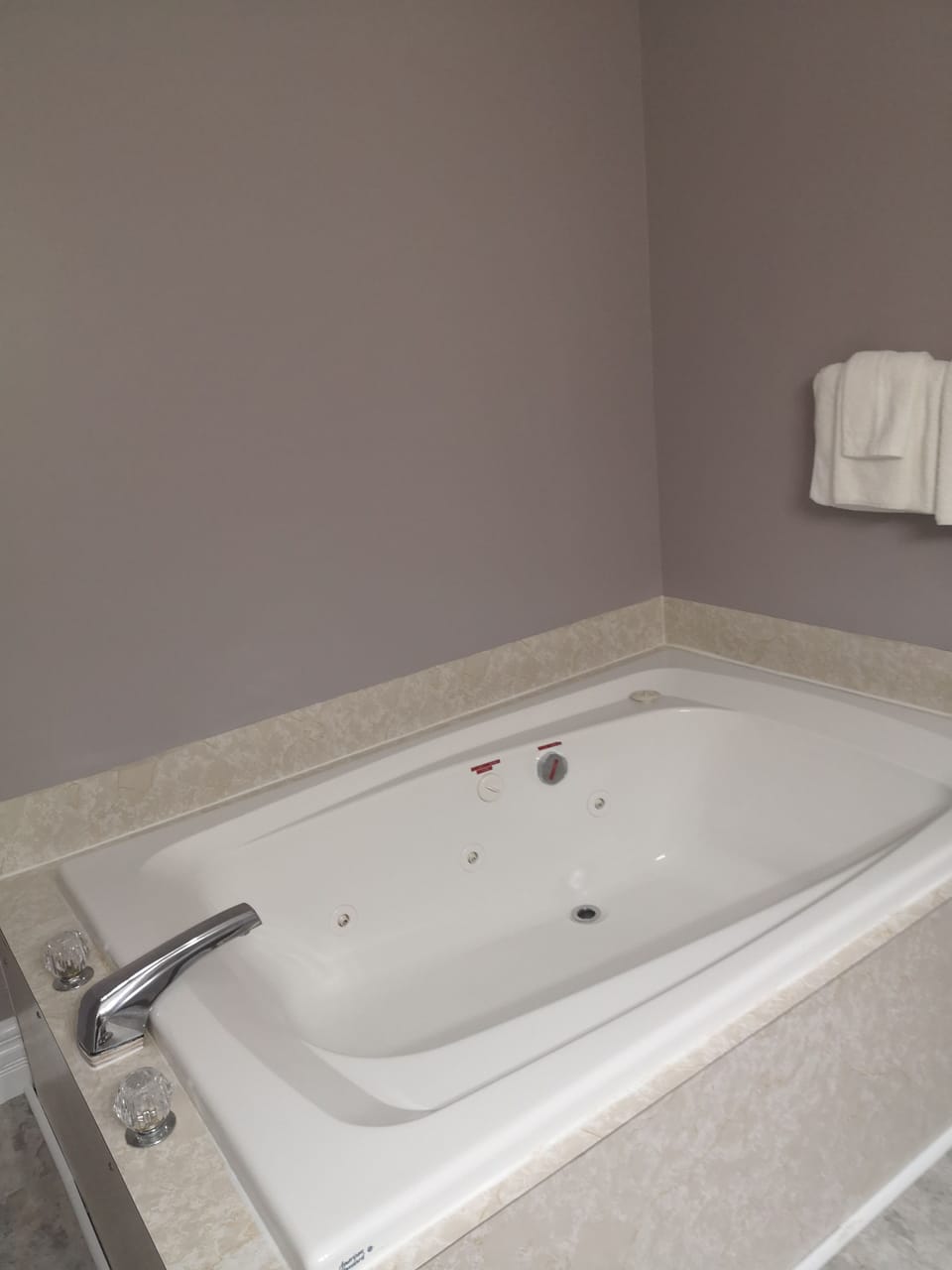 Luxury Suite, Jetted Tub | Bathroom | Combined shower/tub, free toiletries, hair dryer, towels