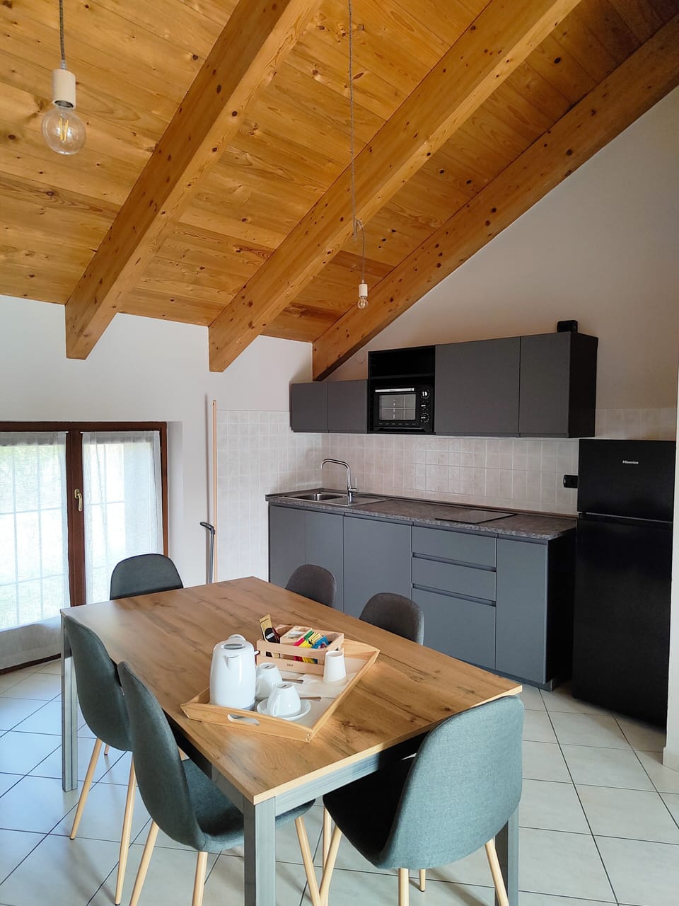Apartment | Private kitchen | Mini-fridge, coffee/tea maker, electric kettle, highchair