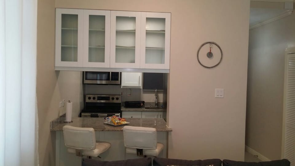 Room, 1 Queen Bed | Private kitchen | Full-size fridge, microwave, oven, stovetop