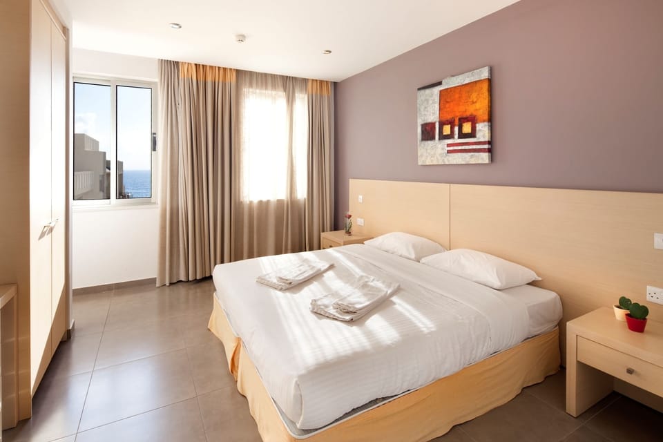 In-room safe, blackout drapes, iron/ironing board, bed sheets