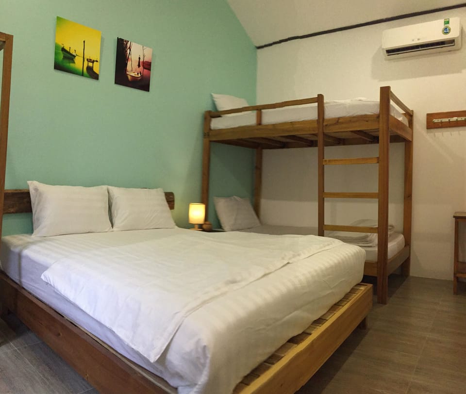 Family Room | Premium bedding, Select Comfort beds, in-room safe, blackout drapes