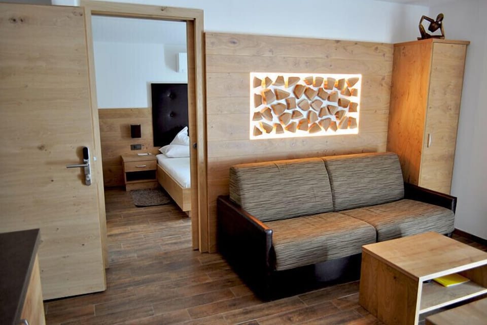 Apartment, 1 Bedroom, Balcony | Living area | Flat-screen TV