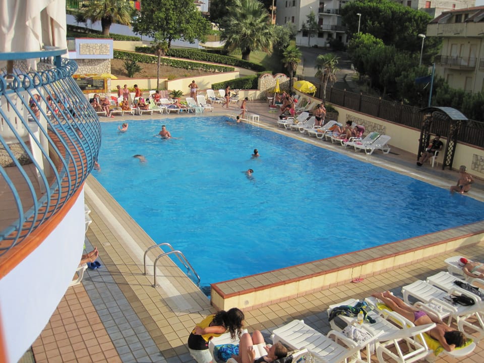 Seasonal outdoor pool, open 9:00 AM to 7:00 PM, sun loungers