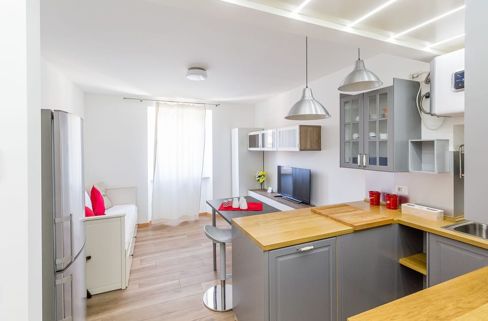 Apartment, 1 Bedroom | Private kitchen | Full-size fridge, microwave, stovetop, dishwasher