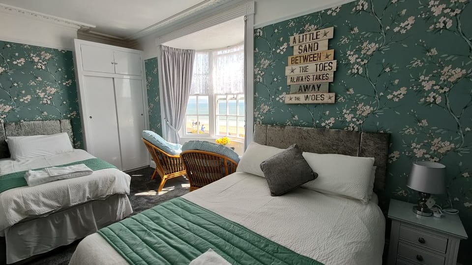 Family Triple Room, Sea View | Iron/ironing board, free WiFi