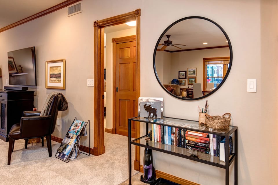 Entryway area and door into guest bedroom area.