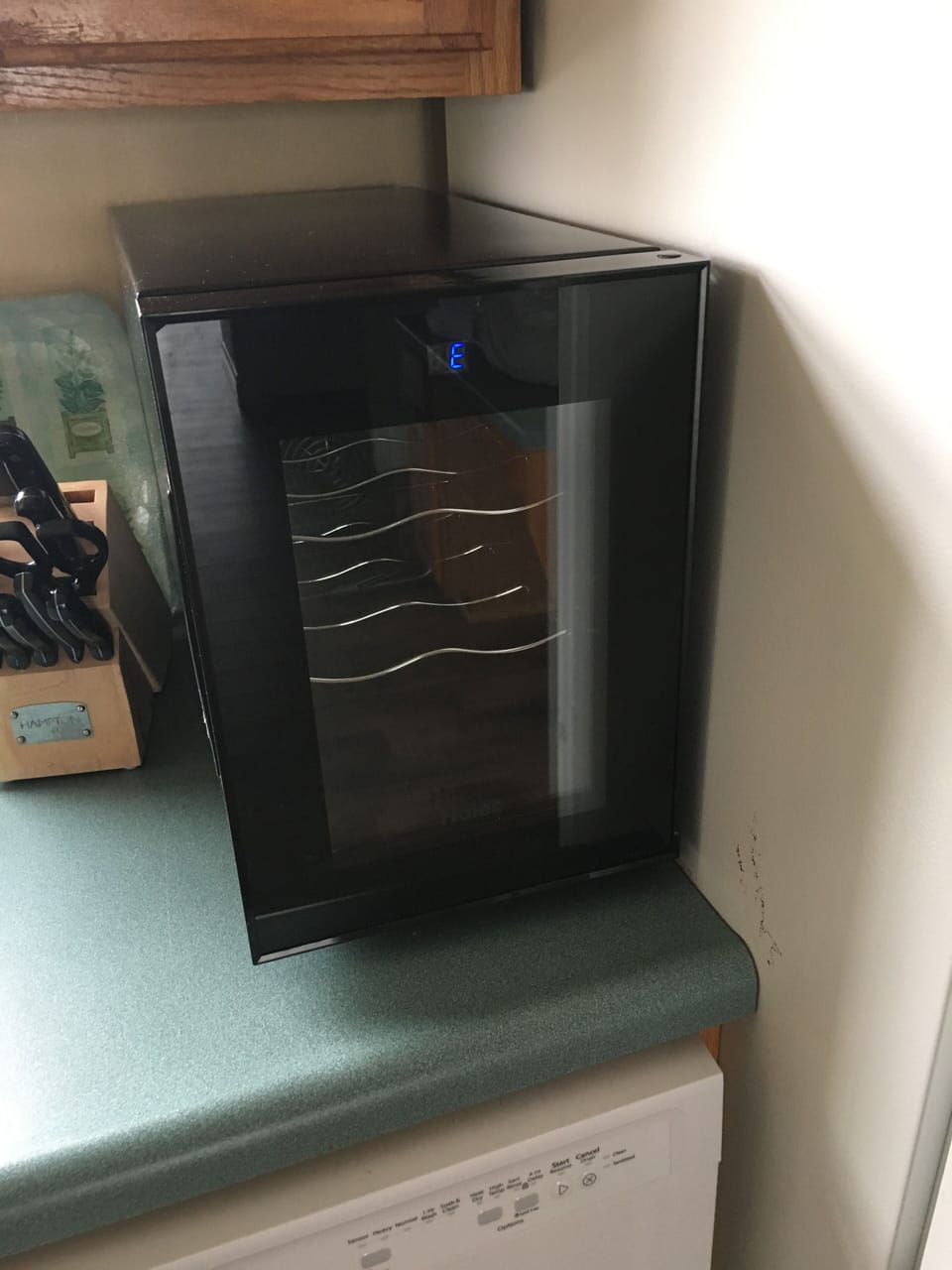 Fully stocked kitchen even has a wine frig!