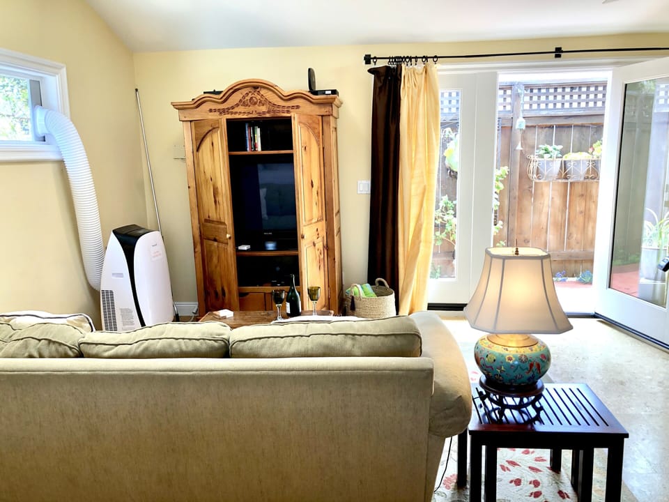 Living space with a/c  
Armoire contains flatscreen t.v.