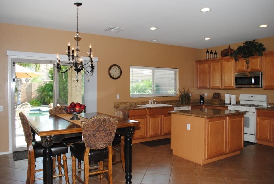 Gourmet Kitchen with center island, granite countertops, and breakfast nook