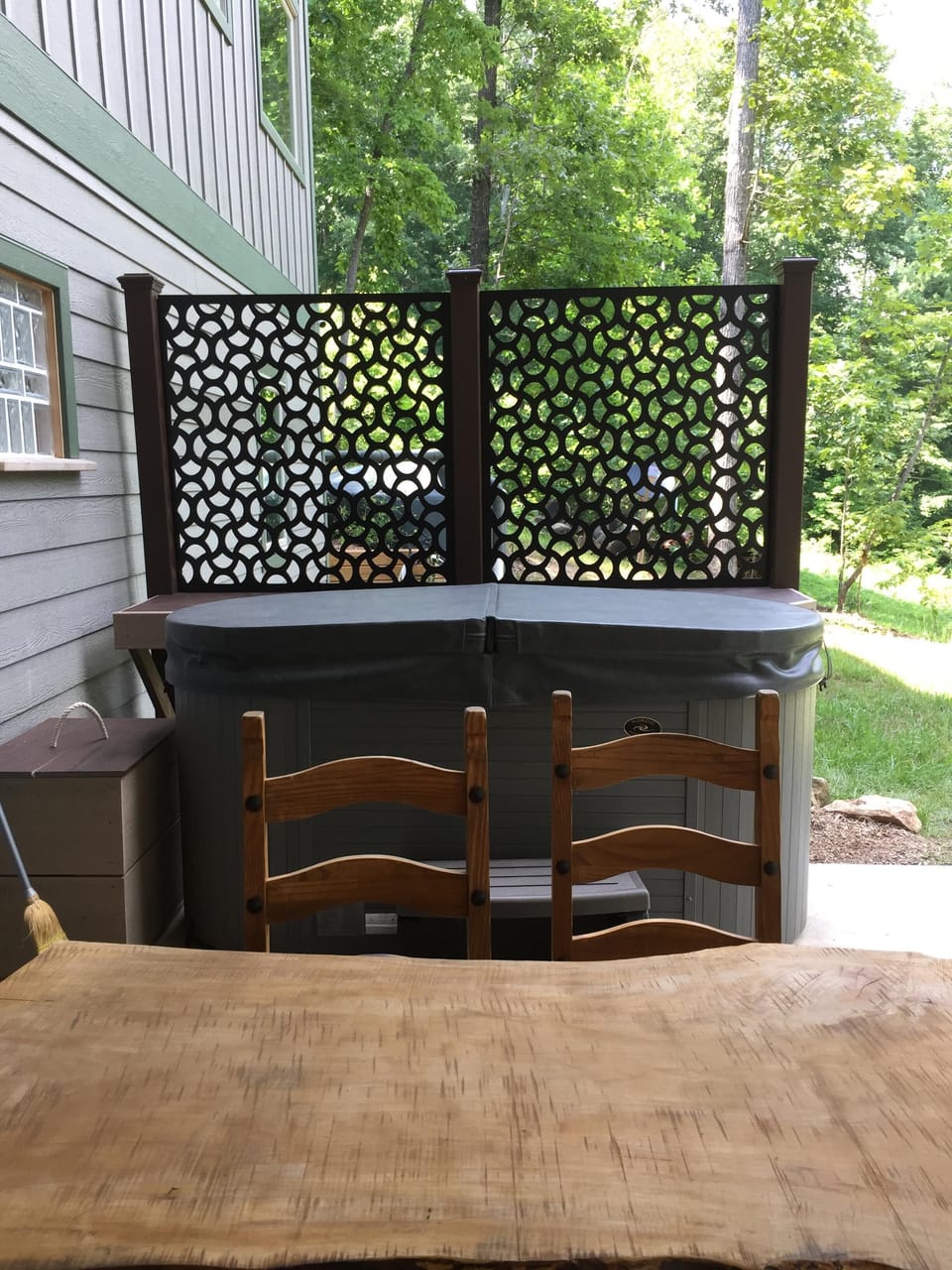 New privacy screen around this darling 2 person hot tub.