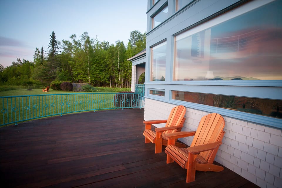 Front Deck facing east with 180 degree mountain views.