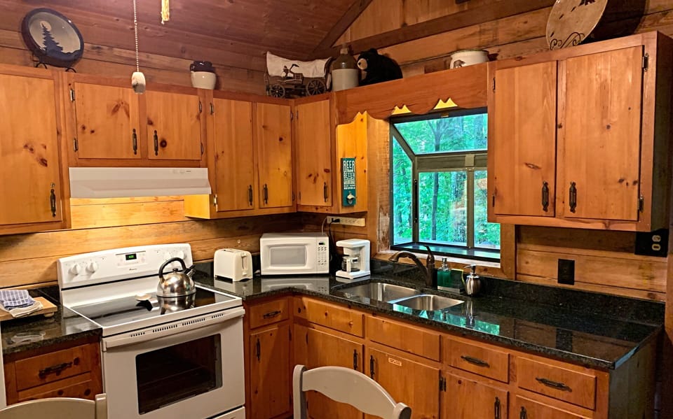 Kitchen with new granite countertops.