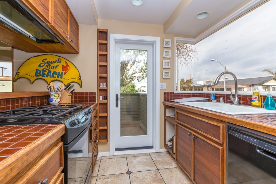 Kitchen with mid-floor patio access