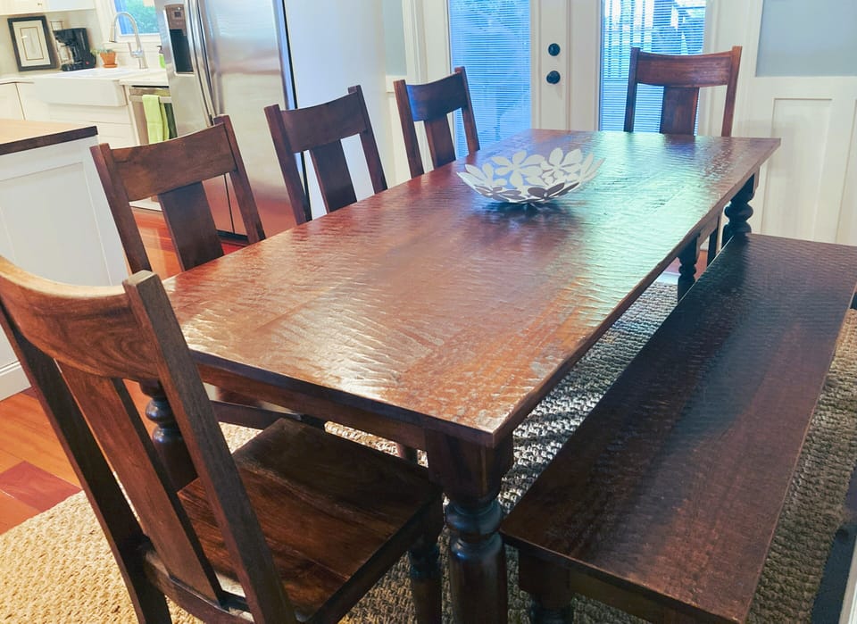 Plenty of room for everyone at this table with 5 chairs and long bench.