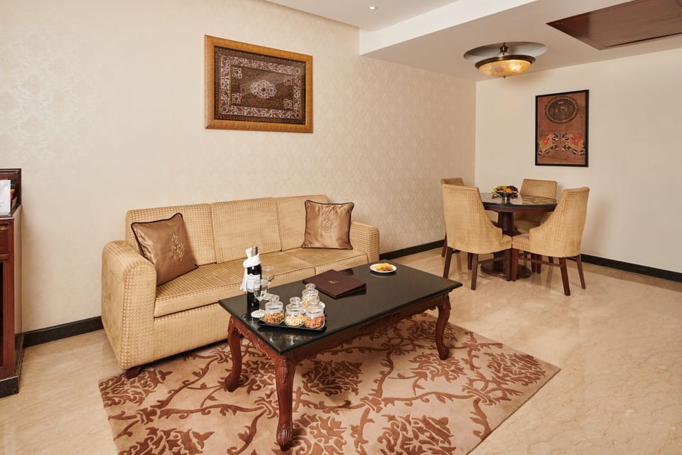 Family Suite | Living area | TV