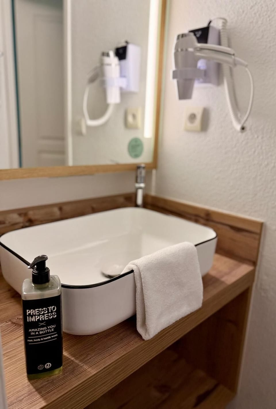 Eco-friendly toiletries, hair dryer, towels, soap