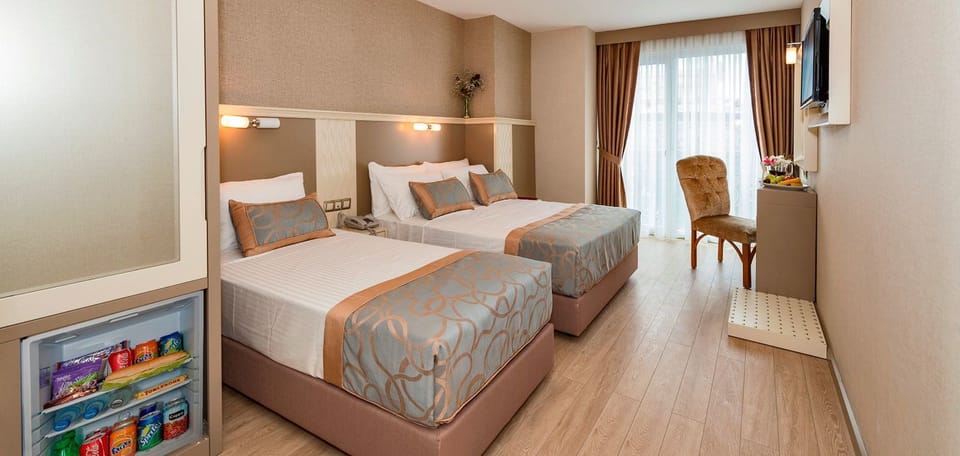 Premium bedding, minibar, in-room safe, desk