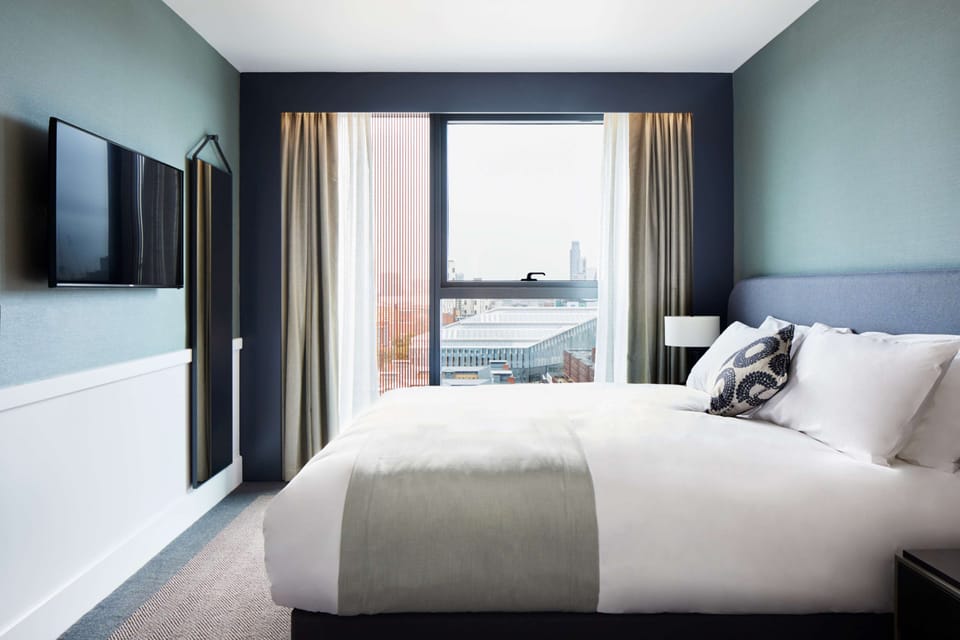 Hypo-allergenic bedding available, in-room safe, desk, laptop workspace