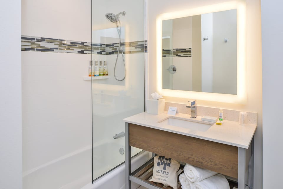 Designer toiletries, hair dryer, towels, soap
