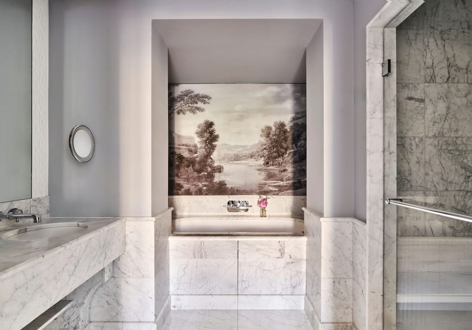 Suite (Prestige Champs Elysées) | Bathroom | Separate tub and shower, rainfall showerhead, designer toiletries