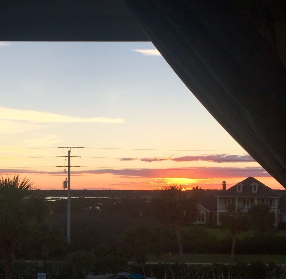 Breathtaking views of the intercostal from the guest bedroom window at sunset 