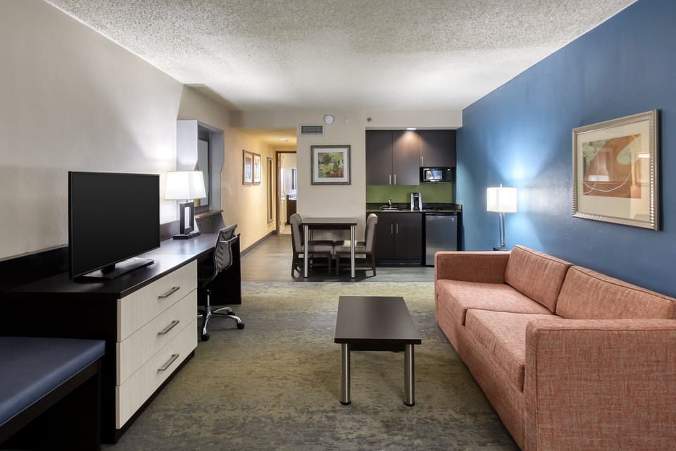 Suite, 1 Bedroom (with Living Area) | In-room safe, desk, laptop workspace, soundproofing