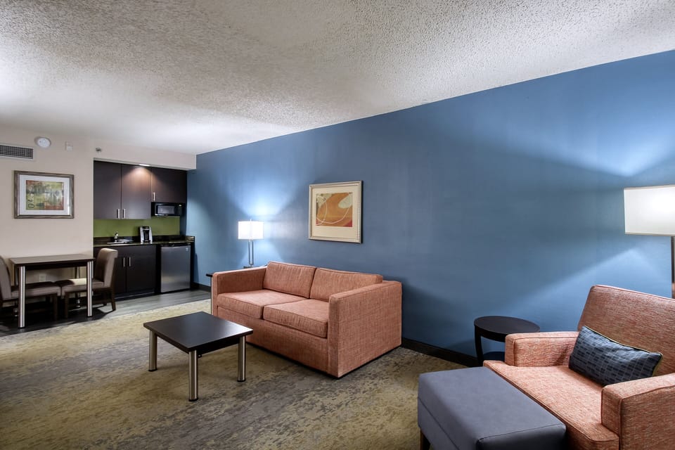 Suite, 1 Bedroom (with Living Area) | In-room safe, desk, laptop workspace, soundproofing