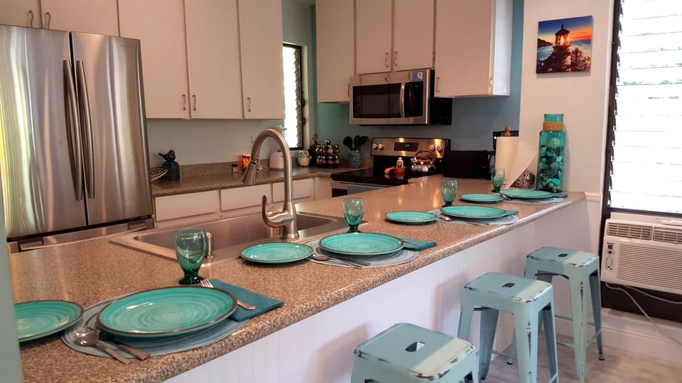 Eat at the breakfast bar, the inside dining table or the outside table! 