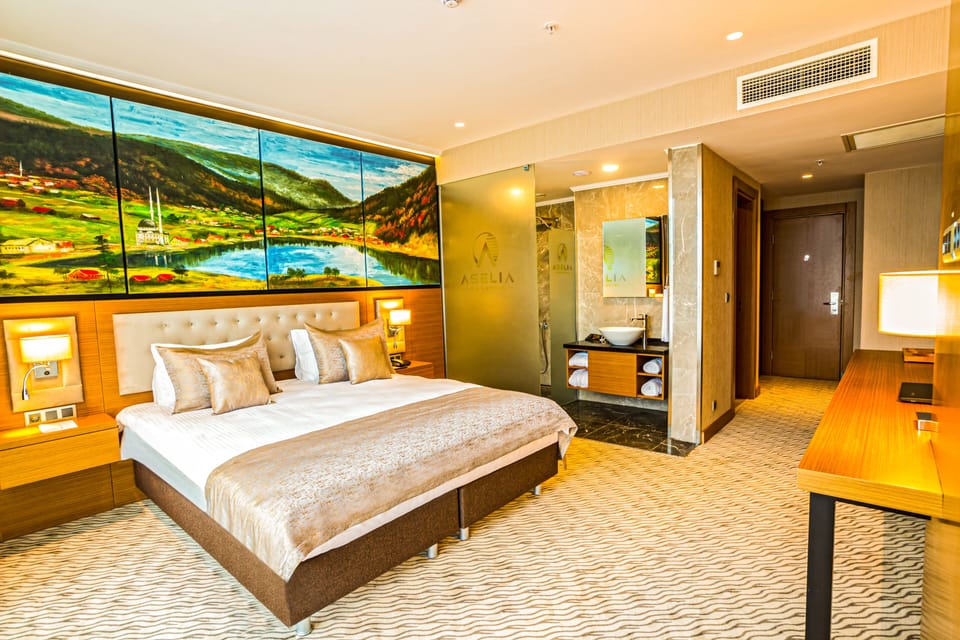 Deluxe Room, City View | Premium bedding, minibar, in-room safe, desk