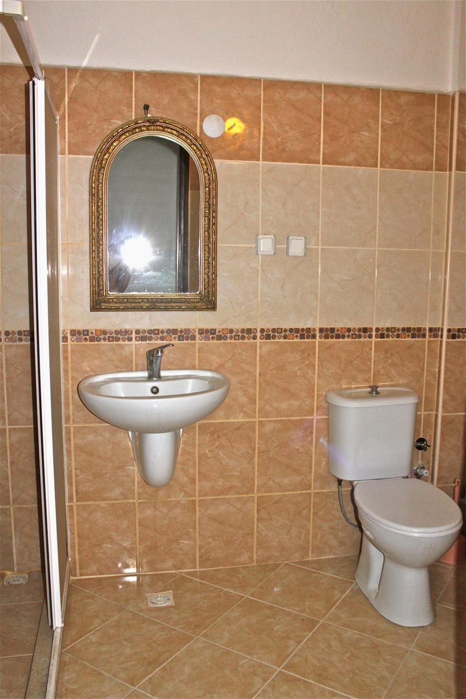 Shower, free toiletries, hair dryer, slippers