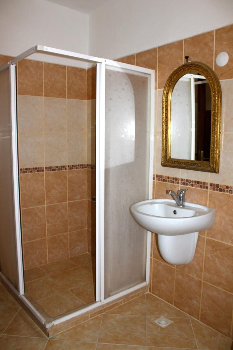 Shower, free toiletries, hair dryer, slippers