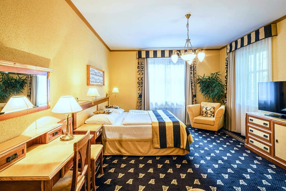 Double or Twin Room | Minibar, desk, blackout drapes, free cribs/infant beds