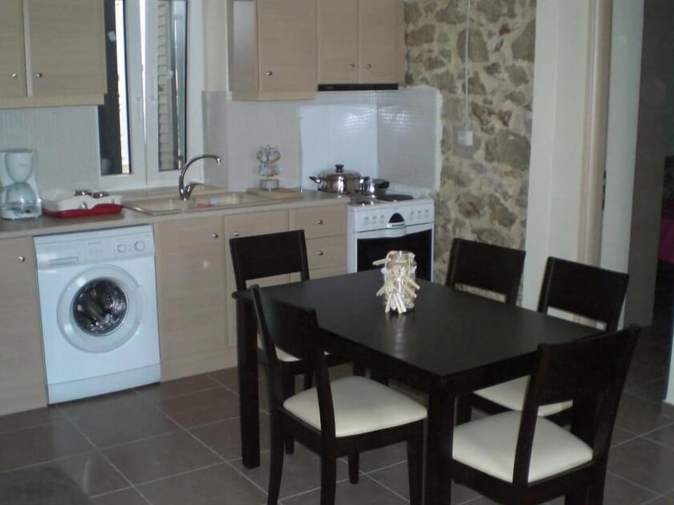 Apartment, 2 Bedrooms | Private kitchen | Full-size fridge, oven, stovetop, coffee/tea maker
