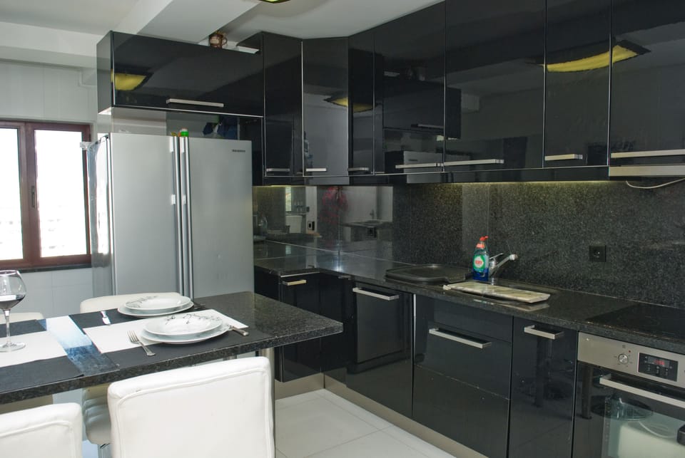 Deluxe Duplex, 3 Bedrooms, Sea View | Private kitchen | Coffee/tea maker, full-size fridge, microwave, oven