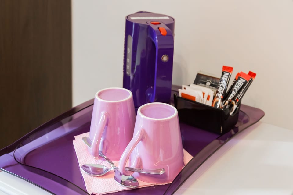 Deluxe Double Room, City View | Coffee and/or coffee maker