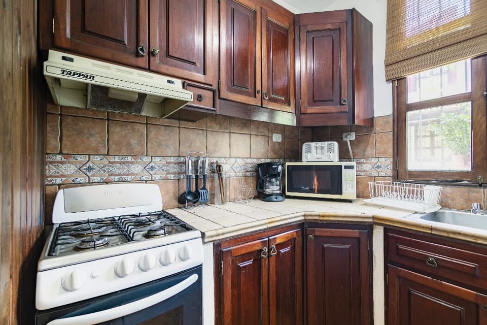 Kitchen, stove and cabinets