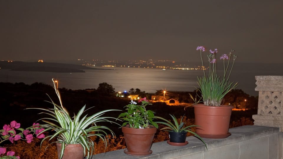 Enjoy a glass of local wine to these moonlight sea views from terraces 1 and 2.