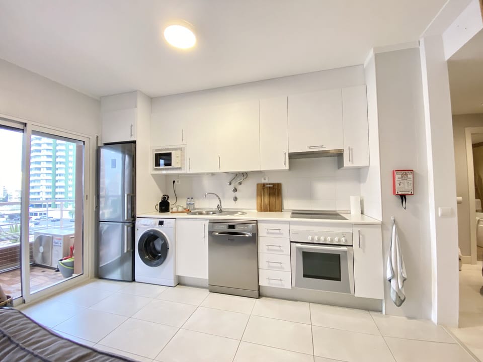Toaster, coffee machine, blender, dish/washing machine, refrigerator,stove,oven.