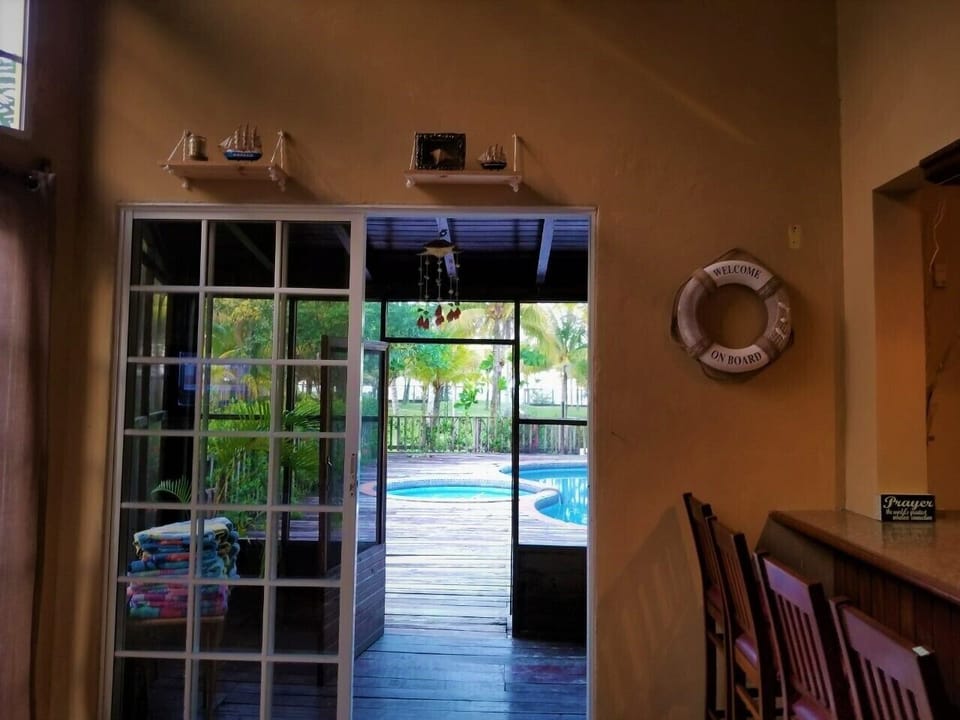 Living Room connects to the pool area.
