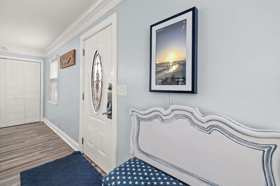 Step into a welcoming front entryway that sets the tone for a cozy, tropical getaway!