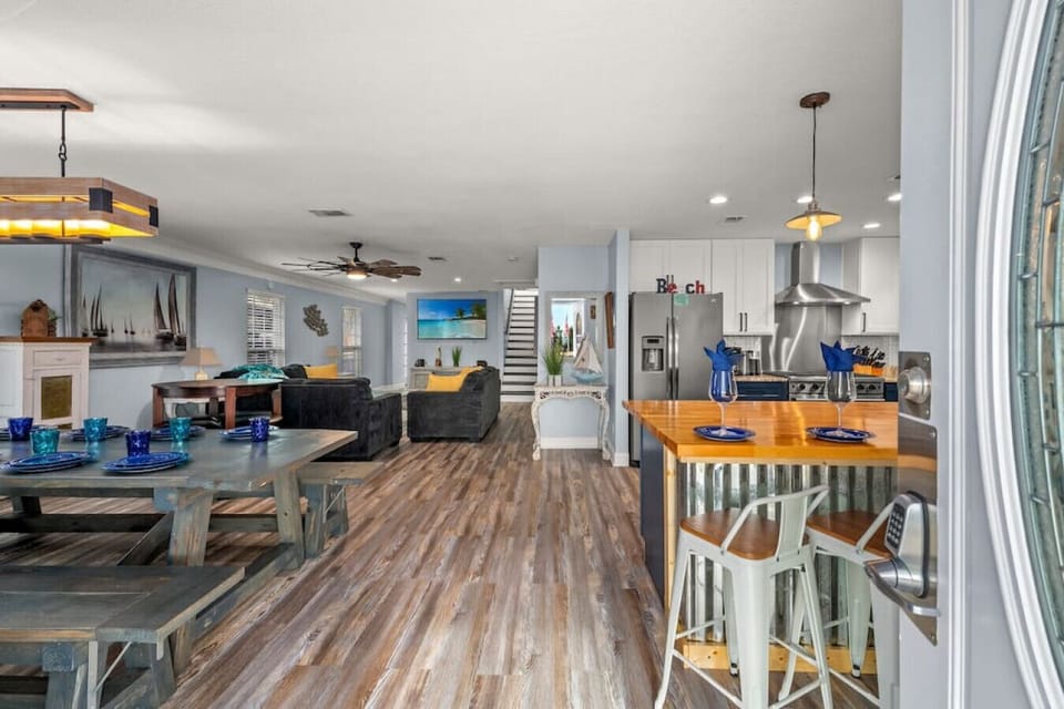 Enjoy the open, airy space where the living room, kitchen, and dining area flow seamlessly together, perfect for relaxing and entertaining!