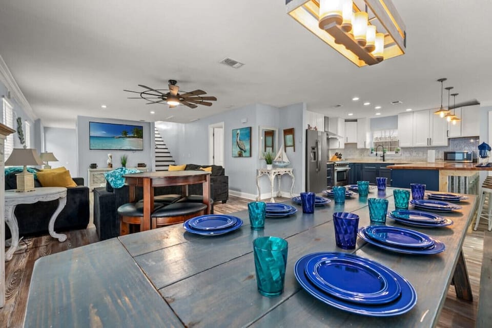 Gather round the spacious dining room table with seamless transition to the kitchen and living room!