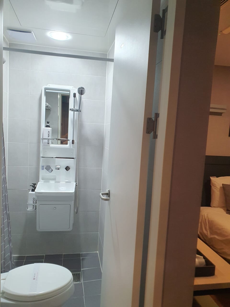 Basic Single Room, 1 Twin Bed, Non Smoking | Bathroom | Shower, free toiletries, hair dryer, slippers