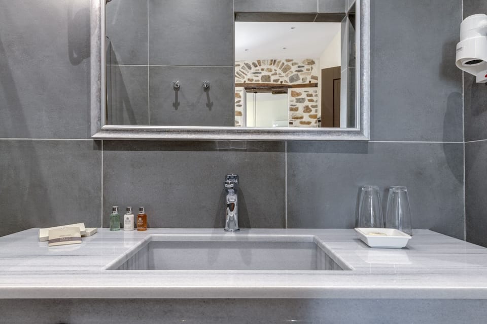 Junior Suite, City View | Premium bedding, memory foam beds, free minibar, in-room safe
