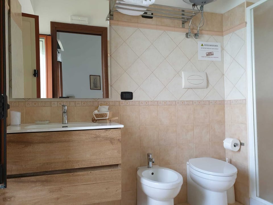 Double Room, Balcony, Sea View | Bathroom | Shower, free toiletries, hair dryer, bidet