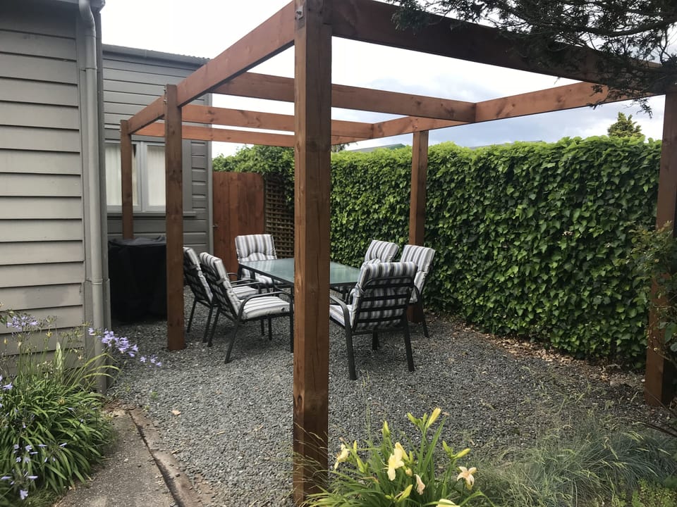 BBQ and outside dining area with easy window access to the kitchen